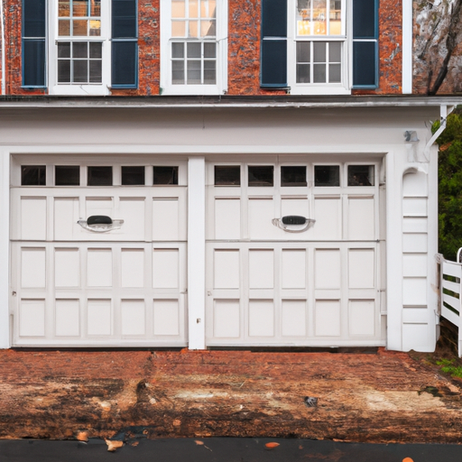Bernardsville colonial home garage door with visible weather seal and damp driveway in overcast late-fall light.